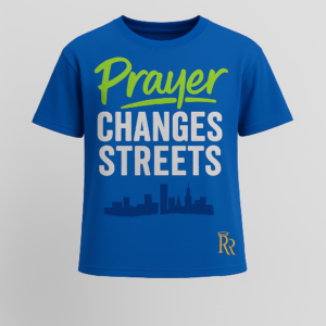 Royal blue Righteous Remnants luxury Christian T-shirt with lime green and white ‘Prayer Changes Streets’ design, skyline print, and gold Double R halo logo.