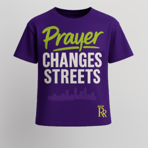 Royal purple Righteous Remnants luxury Christian T-shirt with lime green and white puff print reading ‘Prayer Changes Streets,’ city skyline, and gold Double R halo logo.